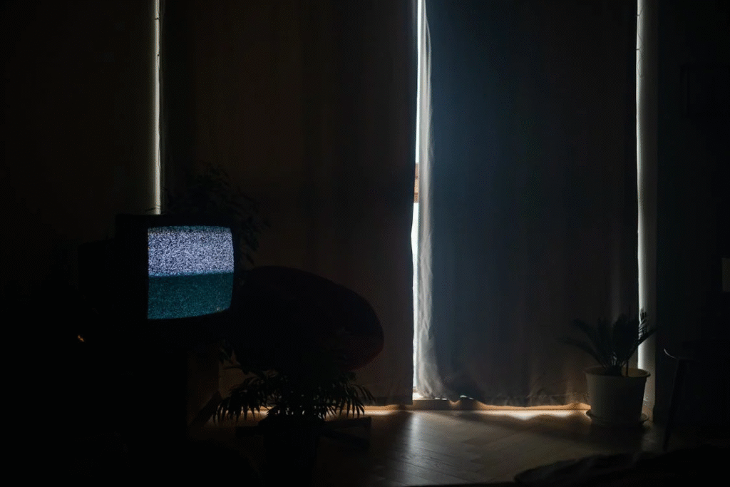 A dark living room with no electricity during a blackout